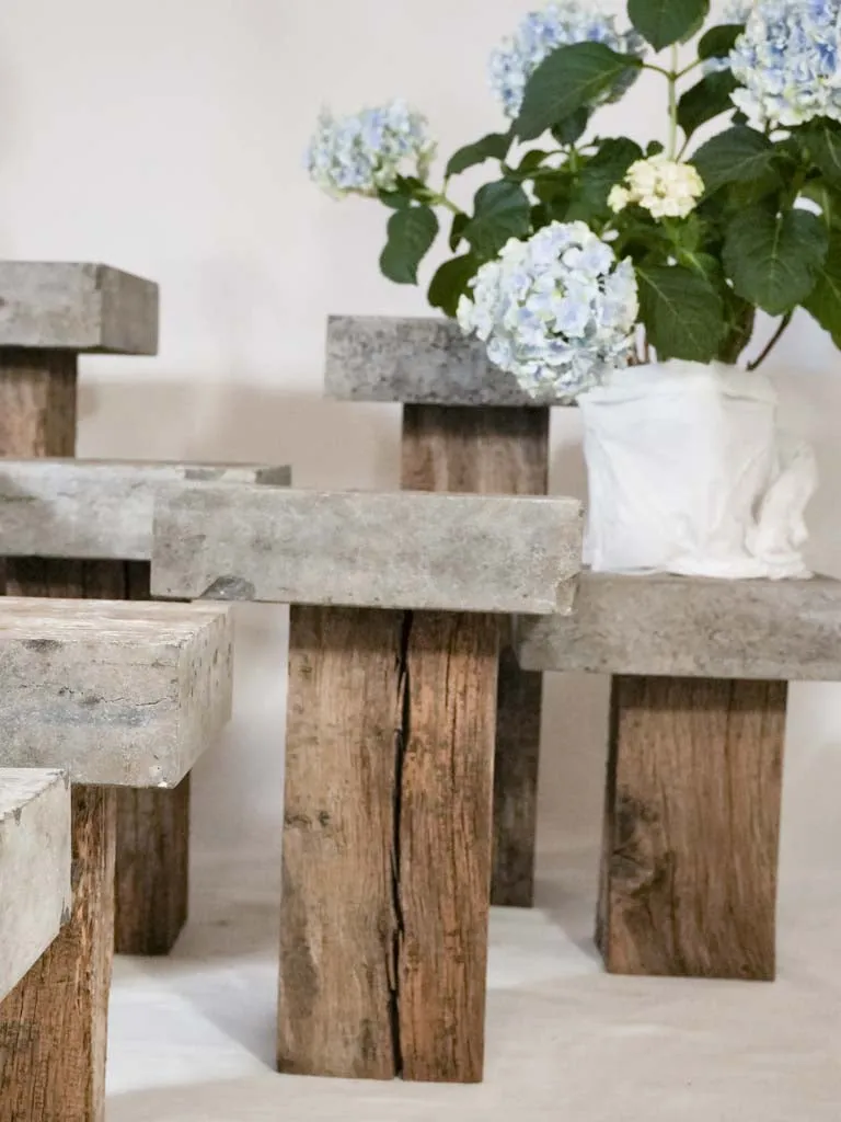 Collection of 14 bluestone and oak garden pedestals