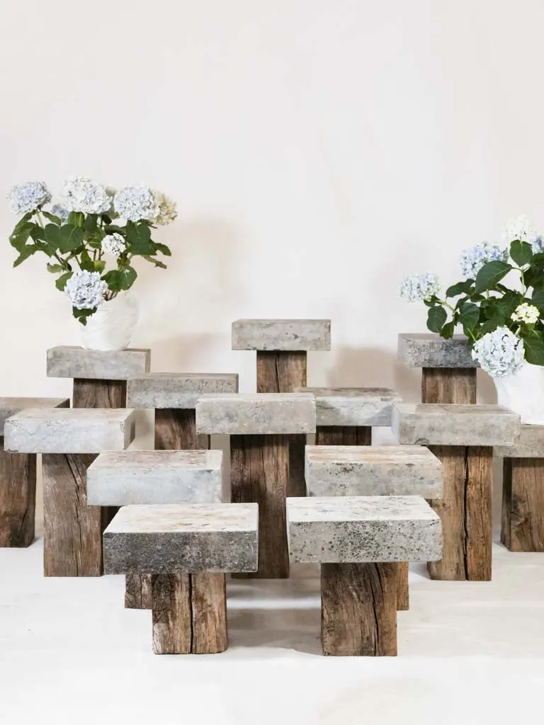 Collection of 14 bluestone and oak garden pedestals