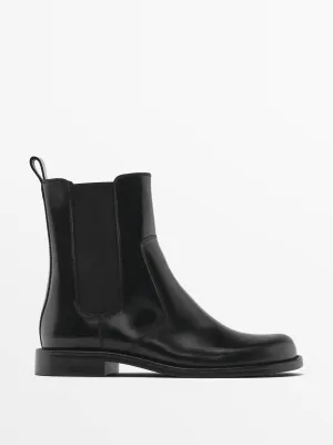 Flat Chelsea boots